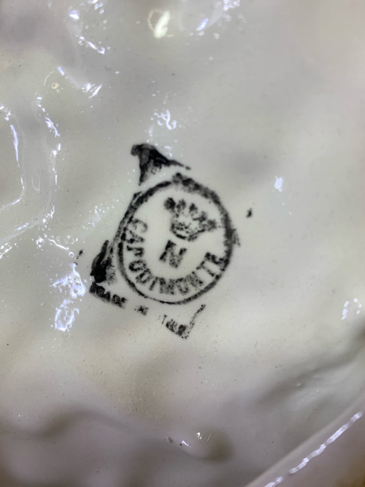 VTG CAPODIMONTE PORCELAIN MAN SITTING ON BARREL FIGURINE.