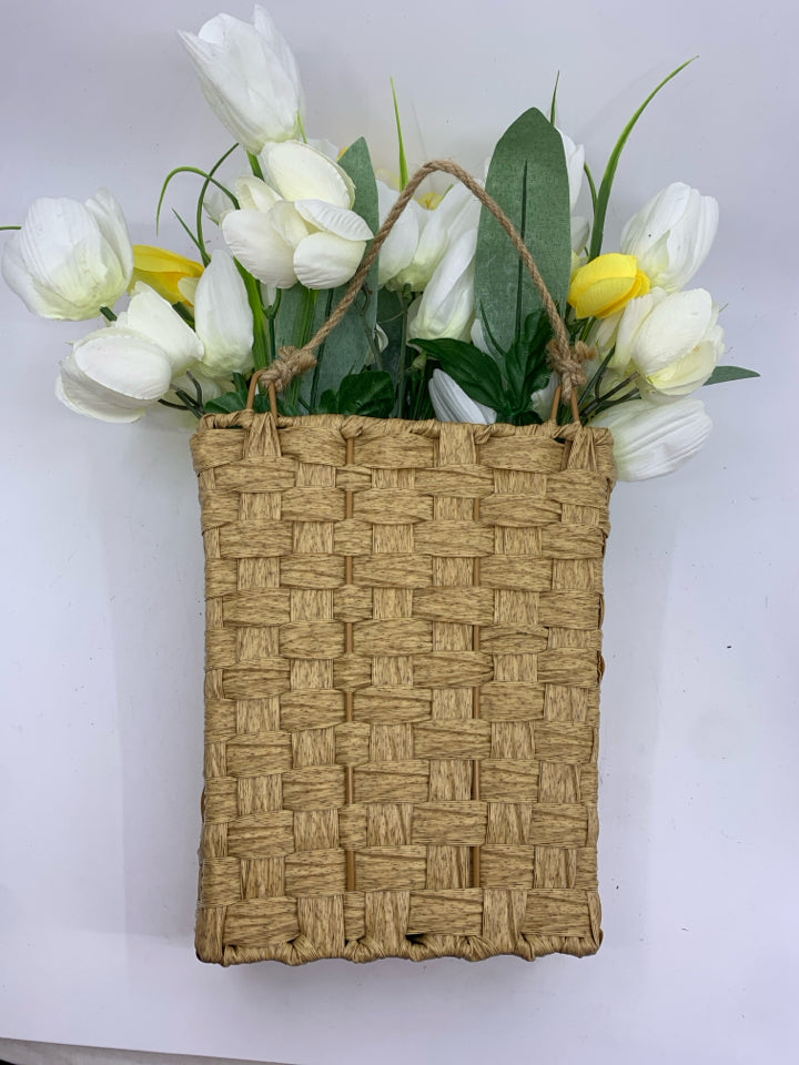 LIGHT WOVEN WALL BASKET W/ WHITE/YELLOW TULIPS.