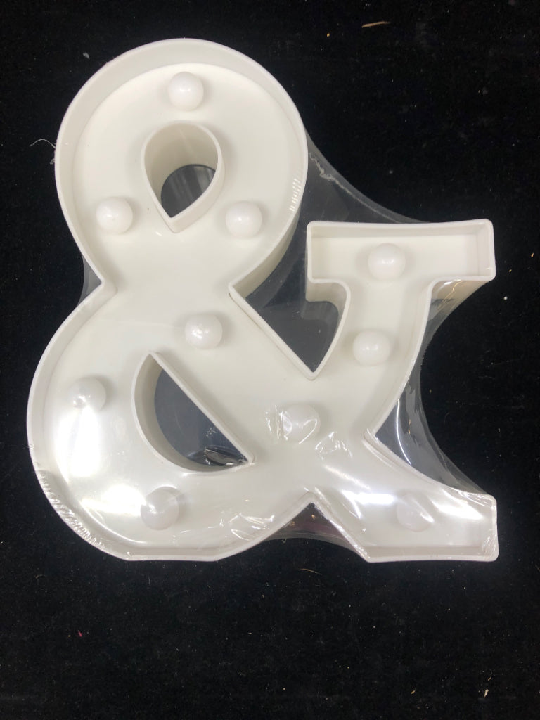 NIP LIGHT UP "&" WHITE SIGN.