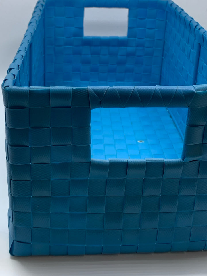 TEAL WOVEN RECTANGLE STORAGE BASKET.