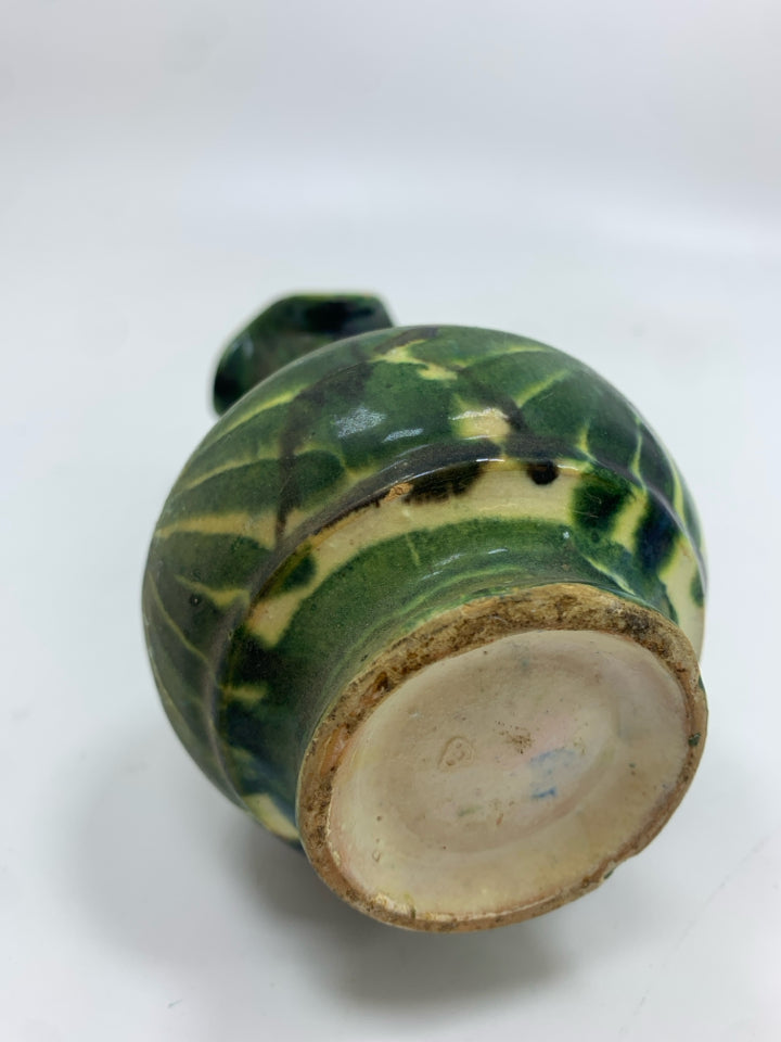 GREEN/TAN CERAMIC VASE W/WAVY RIM.