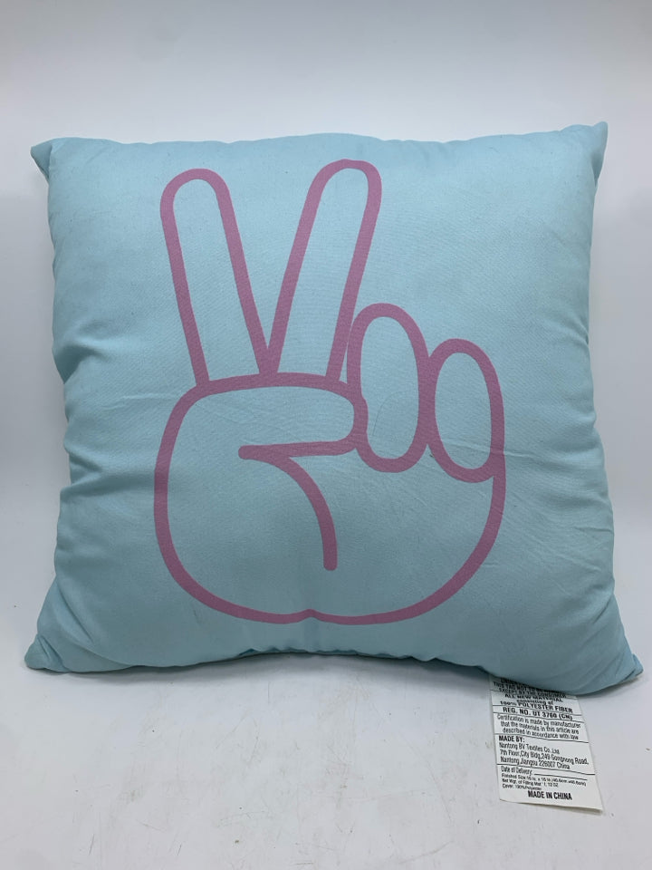 PINK PEACE SIGN THROW PILLOW.