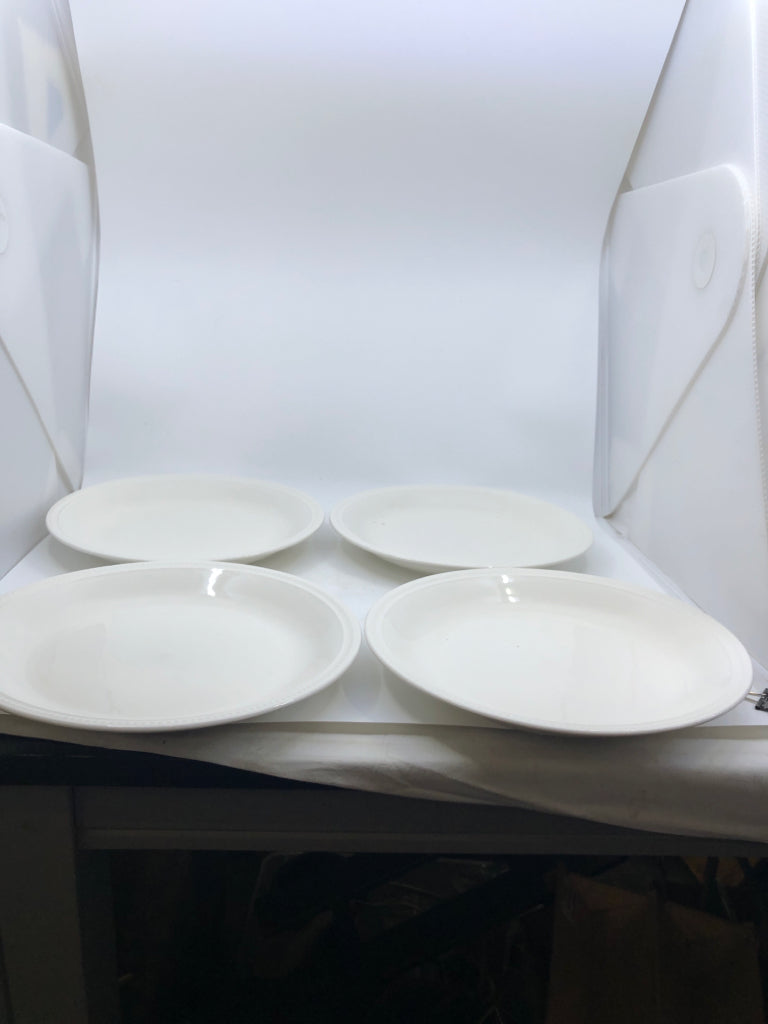 4 WHITE DEEP DINNER PLATES.