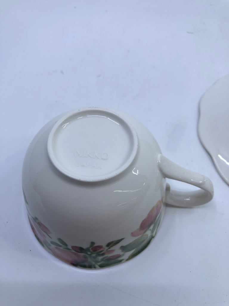 PINK FLORAL WATER COLOR TEACUP AND SAUCER.