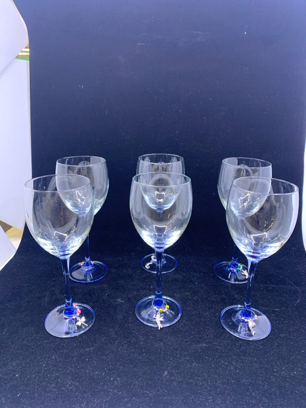6 WINE GLASSES W/ BLUE STEMS W/ WINE CHARMS.