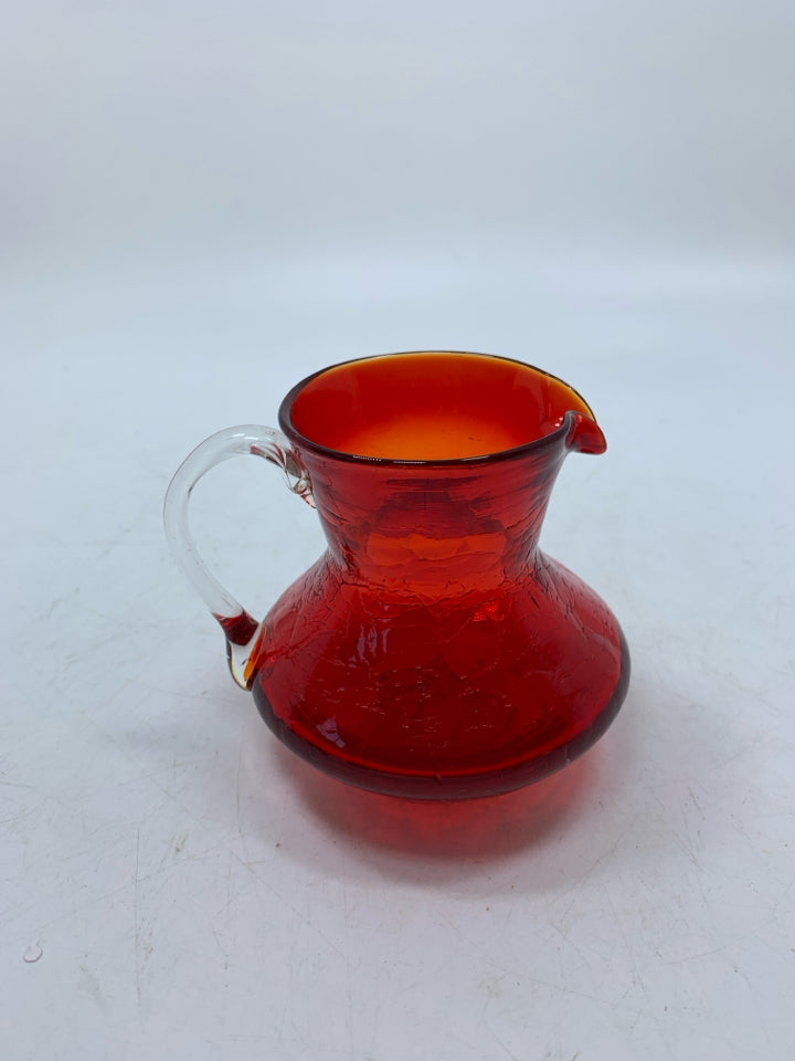 SMALL RED CRACKLE BLOWN GLASS PITCHER.