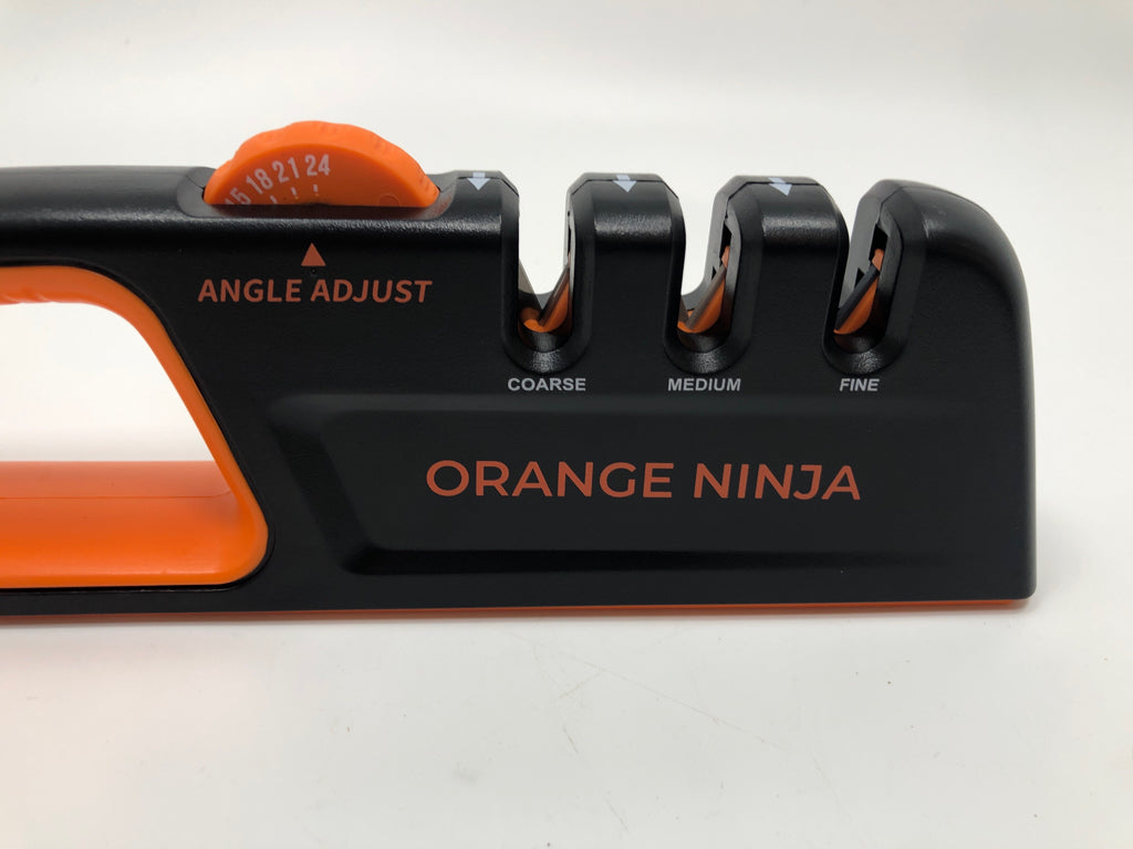 NIB ORANGE NINJA KNIFE SHARPENER.