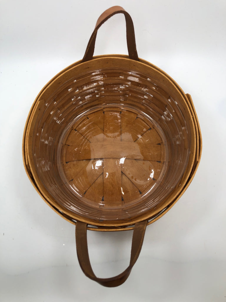 1994 ROUND BASKET W/LEATHER HANDLES.