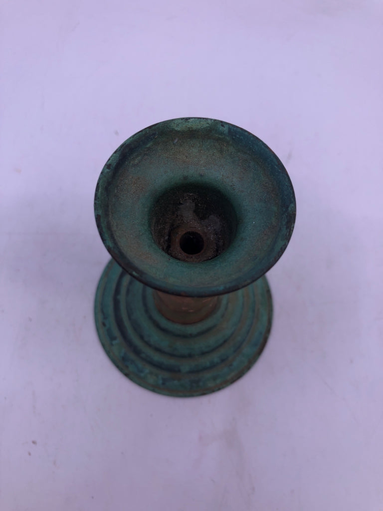 3 COPPER CANDLE HOLDERS W CANDLES.