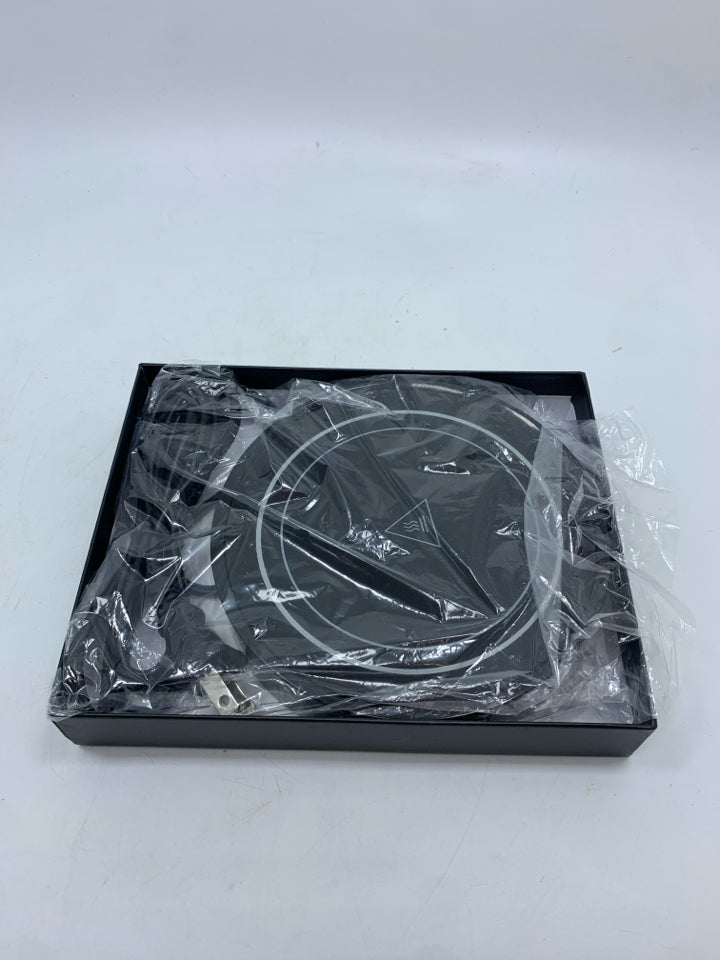 NIB COFFEE MUG WARMER.