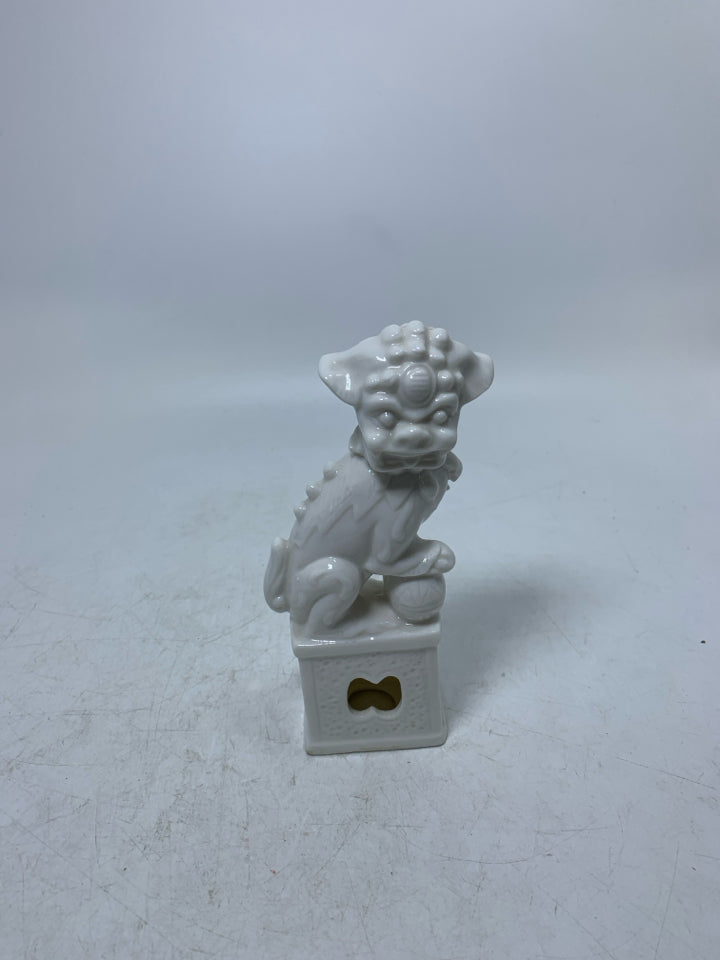 PORCELAIN FOO DOG FIGURINE.