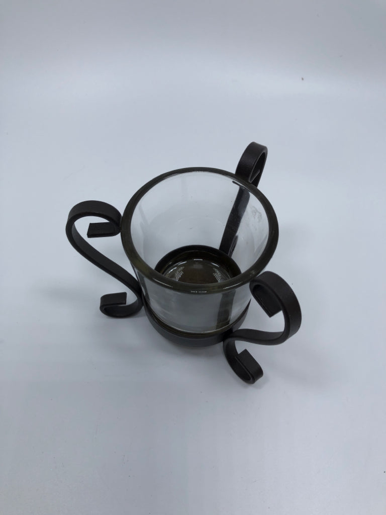 METAL SCROLL VOTIVE CANDLE HOLDER.