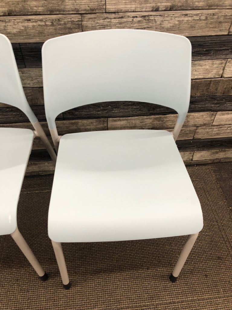 2 LIGHT BLUE OFFICE CHAIRS.