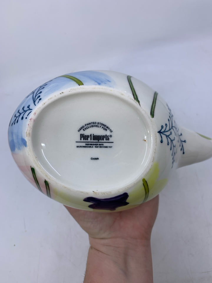 SWAN SHAPED W/ COLORFUL FLOWERS.