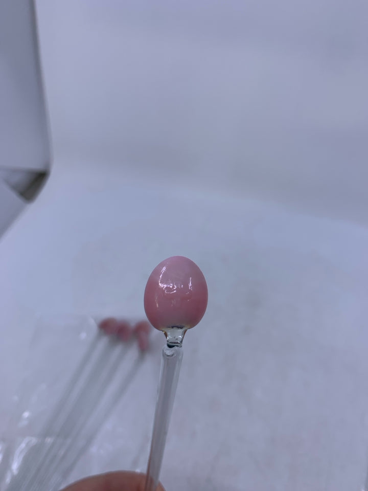 6 GLASS DRINK STRRING SPOONS W/ PINK BASES IN BAG.