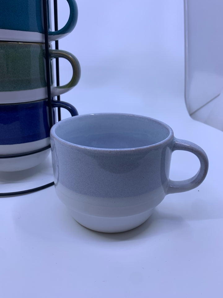 4 WIDE STACKABLE MUGS IN MUG STAND.