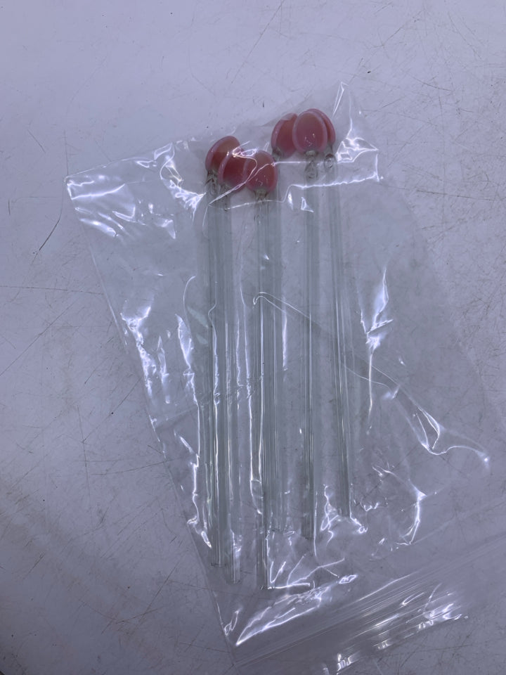 6 GLASS DRINK STRRING SPOONS W/ PINK BASES IN BAG.