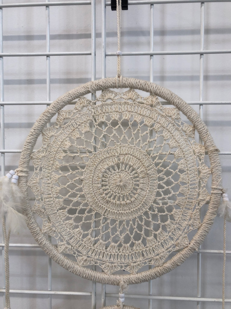 WHITE WOVEN DREAM CATCHER.