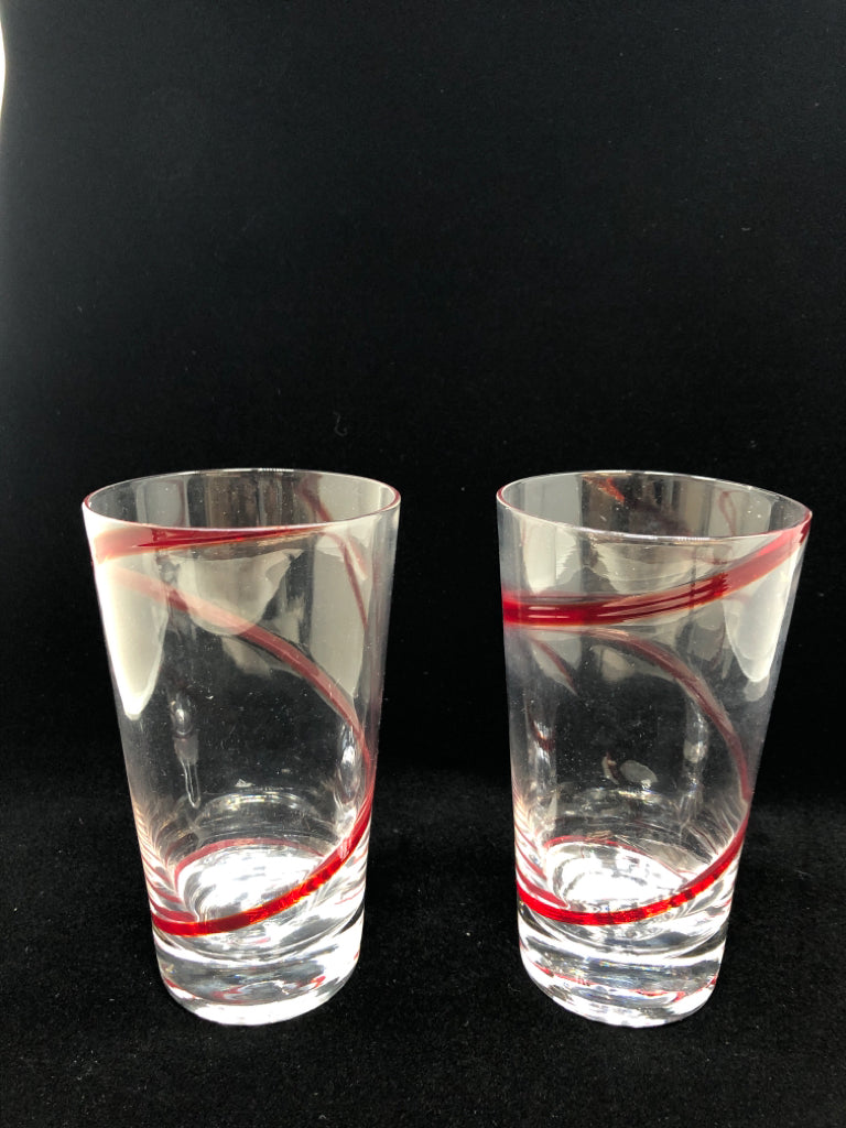 2 RED SWIRL GLASSES.