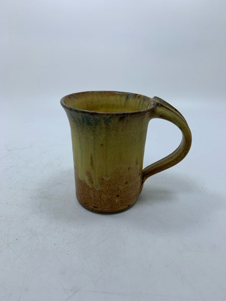 YELLOW/TAN POTTERY MUG.