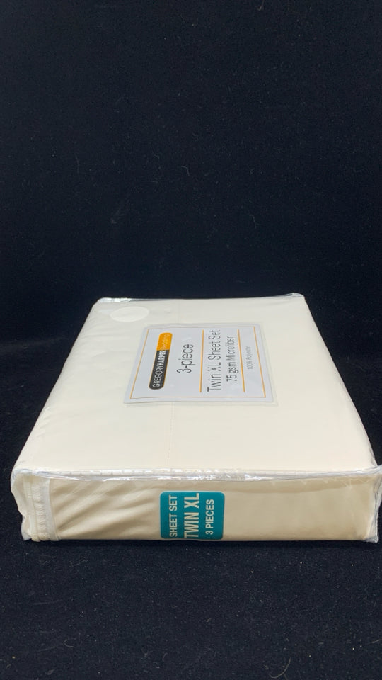 NIP TWIN XL CREAM SHEET SET.