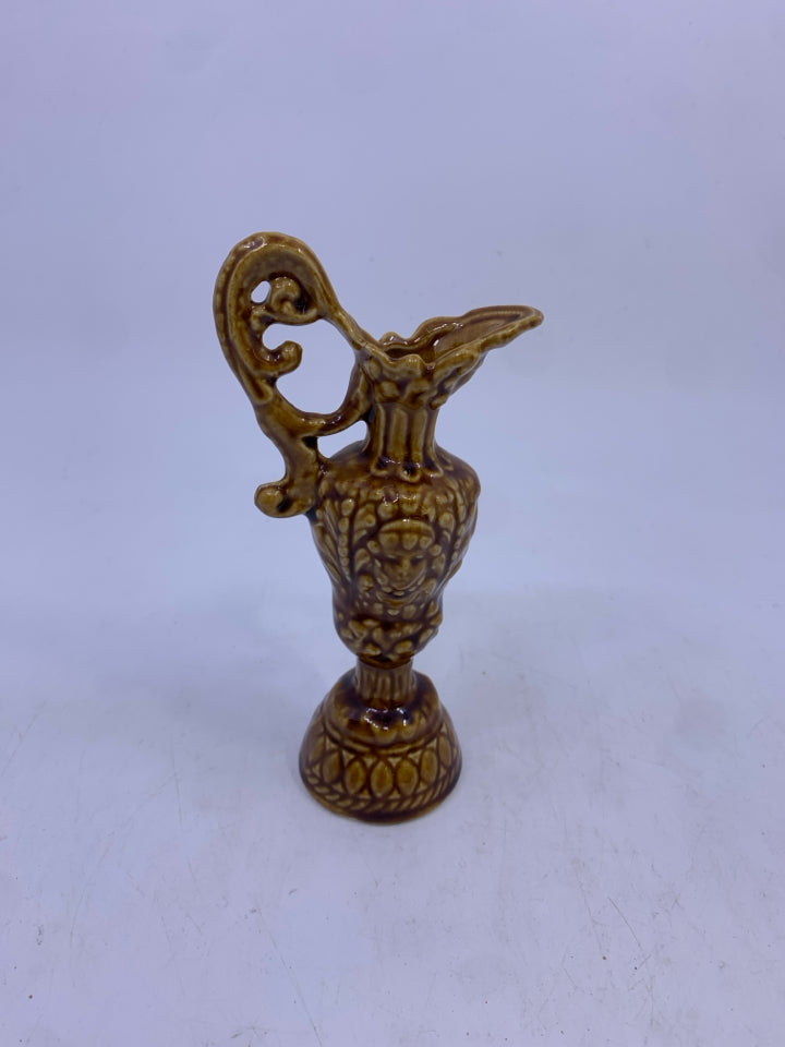 VTG BROWN EMBOSSED CERAMIC PITCHER.