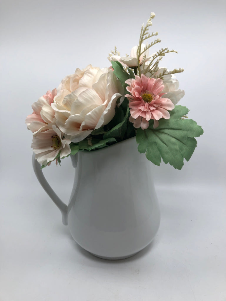 PINK FLORALS IN WHITE PITCHER.