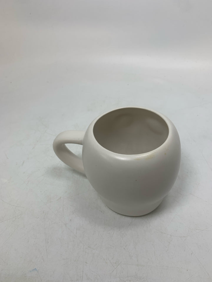 WHITE SKULL HEAD MUG.