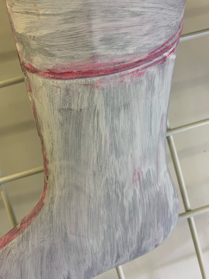 METAL STOCKING PAINTED WHITE W/ HOLLY AND GREENERY.