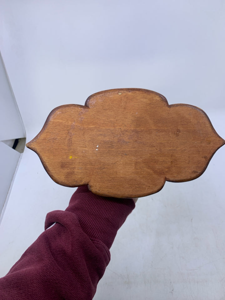 WOOD CARVED TAPERED CANDLE HOLDER.