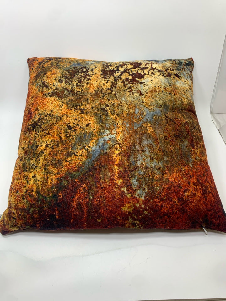 ABSTRACT ORANGE/RED PRINT PILLOW.