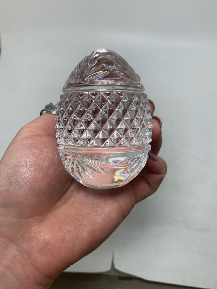 HEAVY GLASS TEXTURE EGG ON METAL STAND.