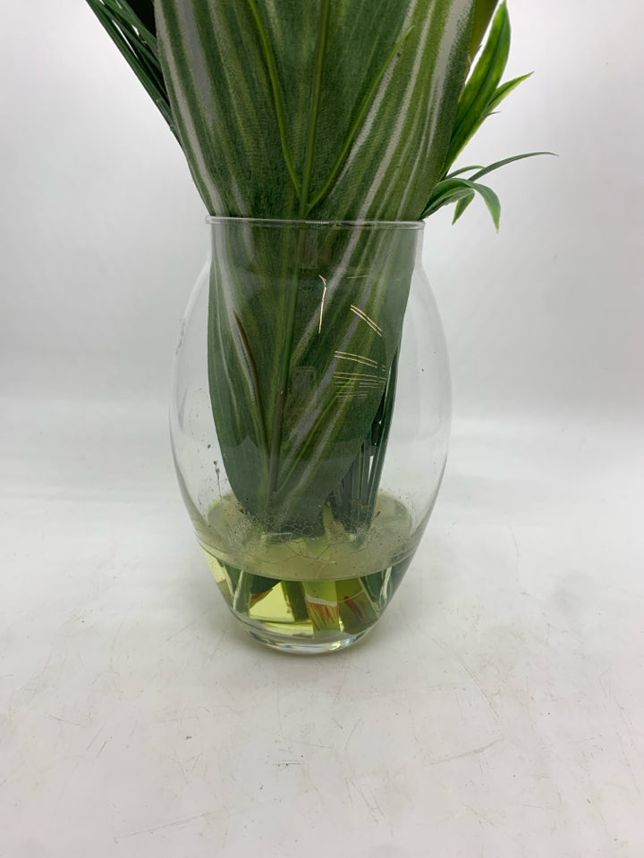 FAUX TROPICAL FLOWER IN CLEAR VASE.