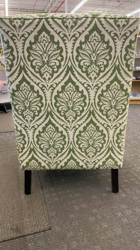UPHOLSTERED GREEN PATTERNED ACCENT CHAIR.