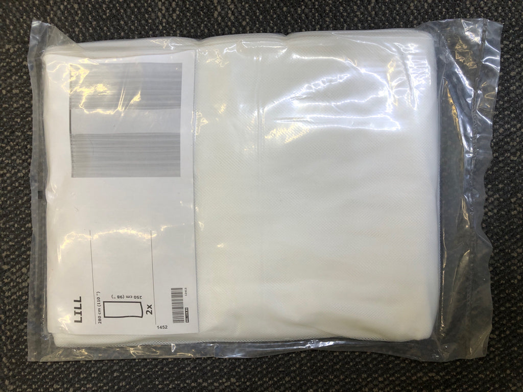 NIP 2 LILL WHITE CURTIAN PANELS.