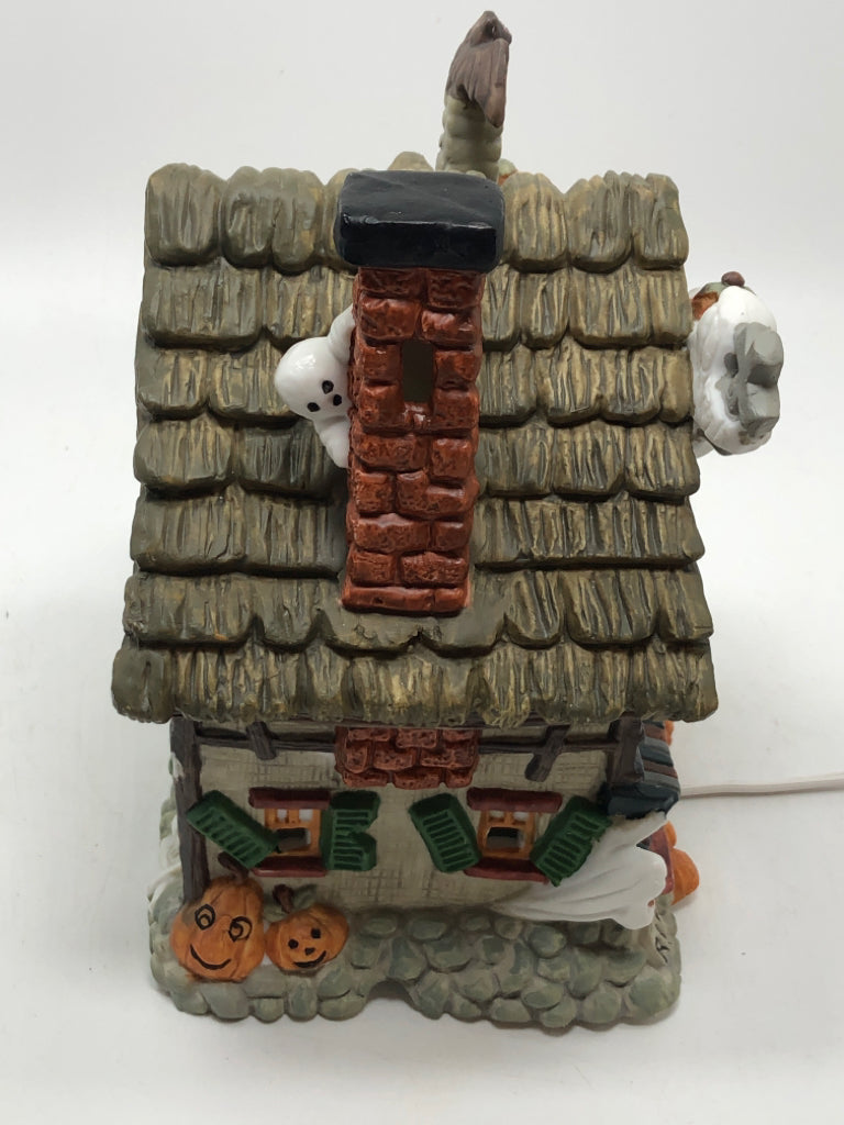 PORCELAIN ILLUMINATED HAUNTED HOUSE W/GHOSTS.