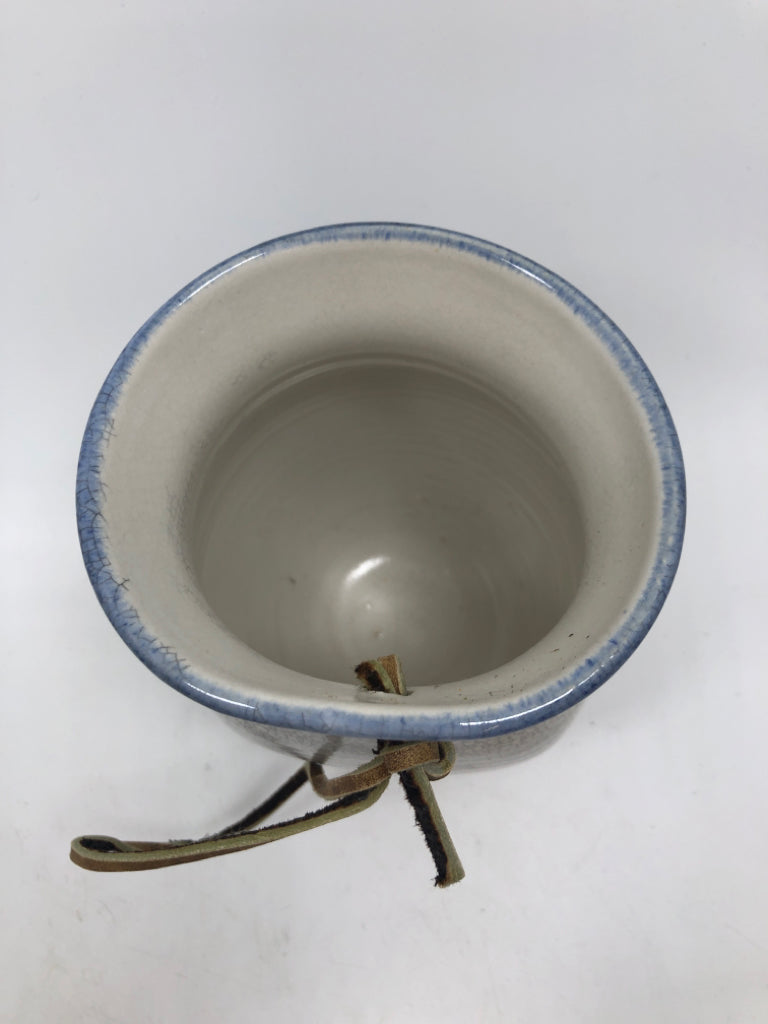 BLUE FLORAL CRAZED HANGING POTTERY VASE.