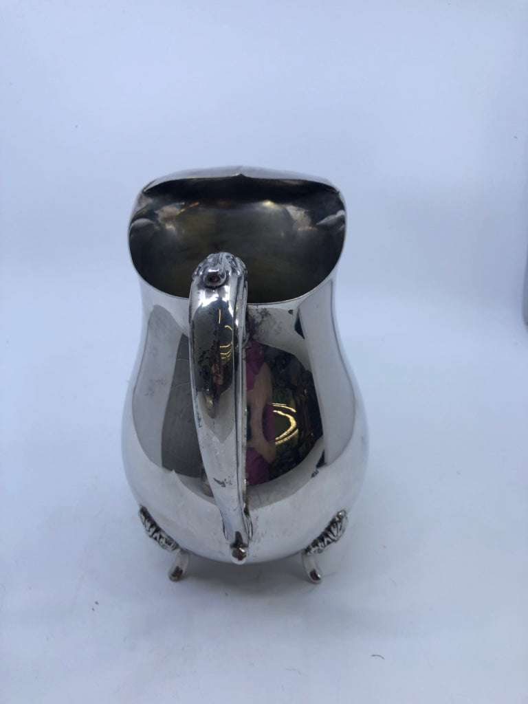 VTG SILVER FOOTED PITCHER W ICE LIP.