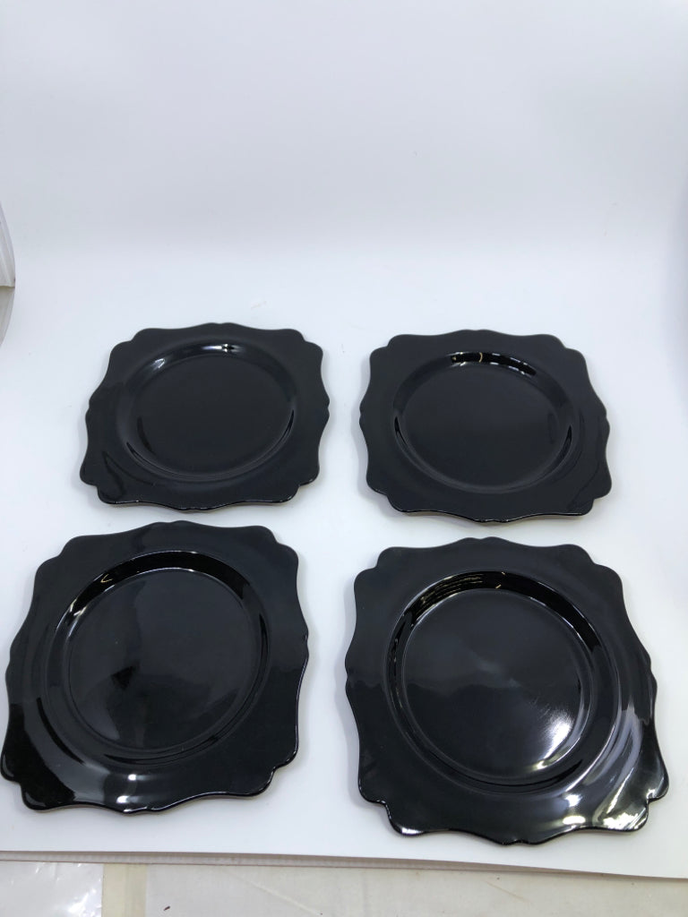 4 GLASS BLACK APPETIZER PLATES.