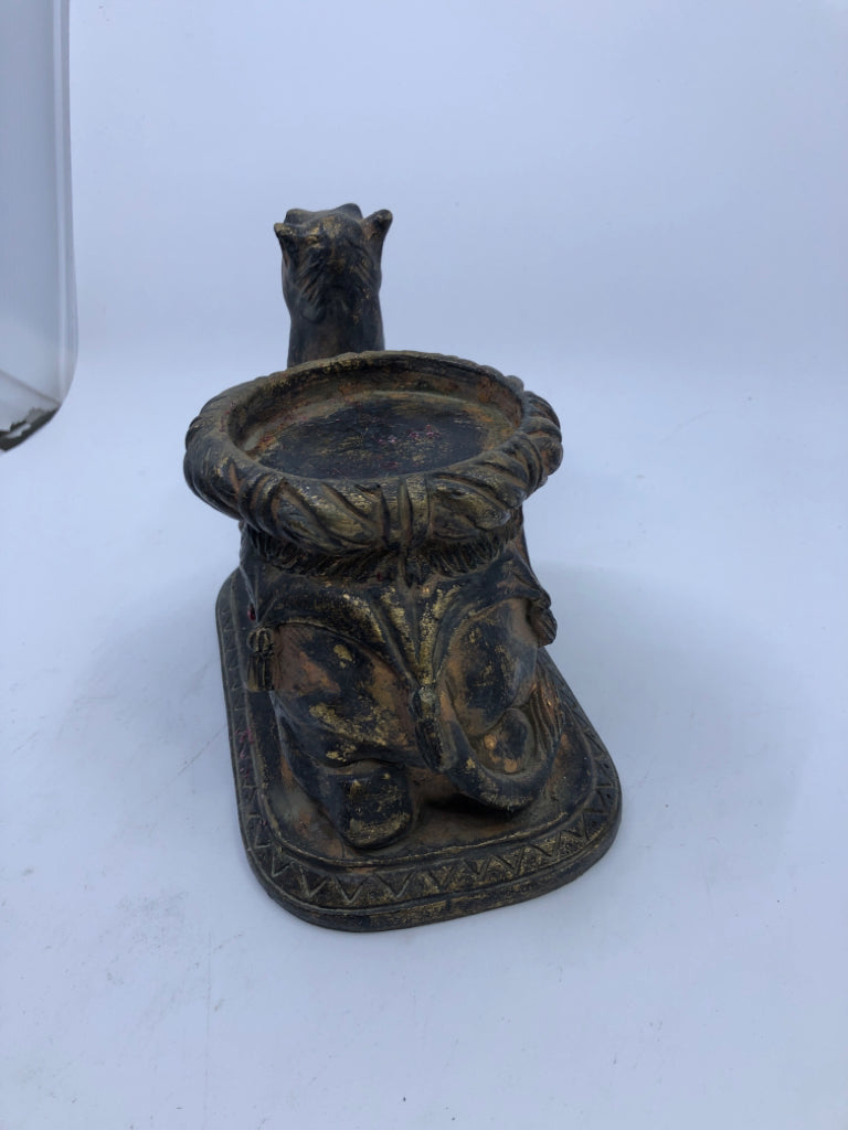 VTG DISTRESSED LAYING CAMEL PILLAR CANDLE HOLDER.