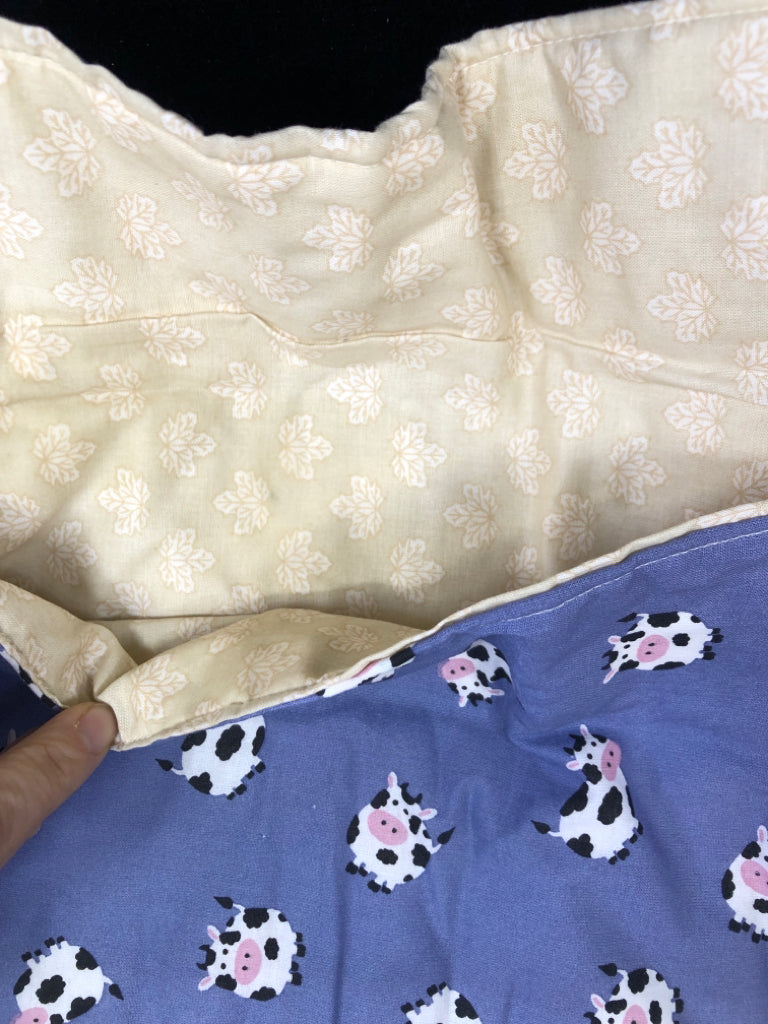 BAKED POTATO BAG W COWS ON IT.