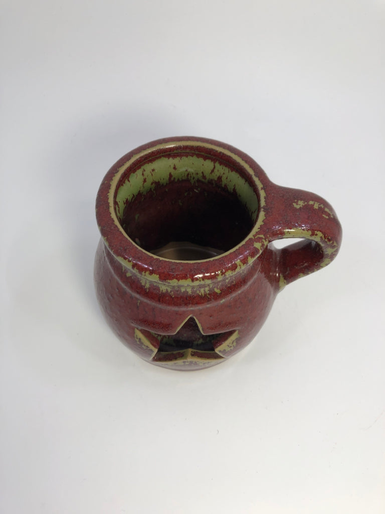 PRIMITIVE RED&GREEN GLAZED TEA LIGHT HOLDER W/STAR CUT OUT.