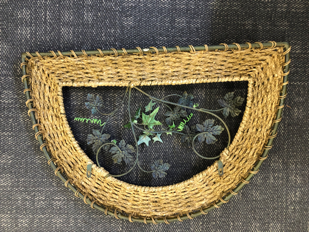 GREEN IVY AND WICKER WALL HANGING.