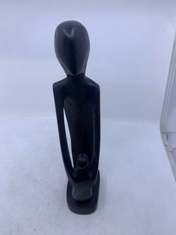 BLACK CARVED WOOD FOLK ART MAN & CHILD.