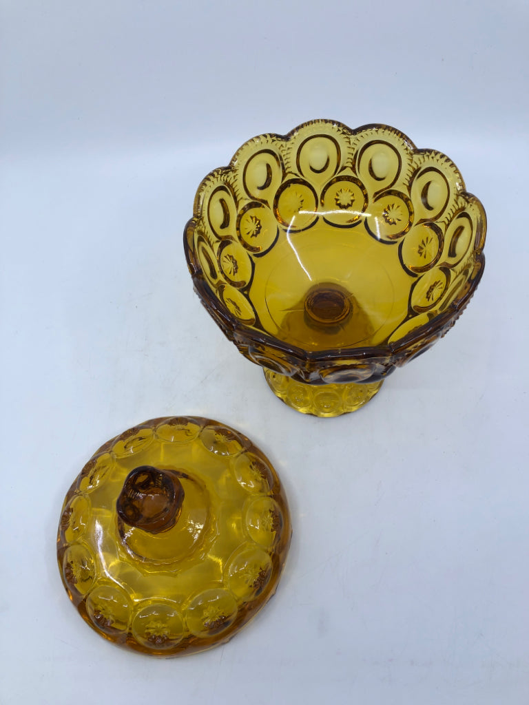 VTG FOOTED AMBER GLASS EMBOSSED CANDY DISH.
