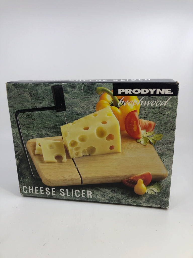 NIB CHEESE SLICER.