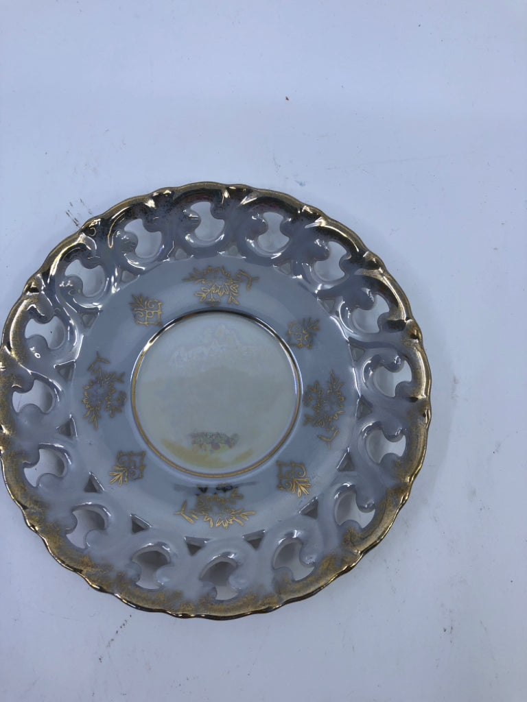 VTG LIGHT BLUE LACE PATTERN TEACUP AND SAUCER W GOLD ACCENTS.