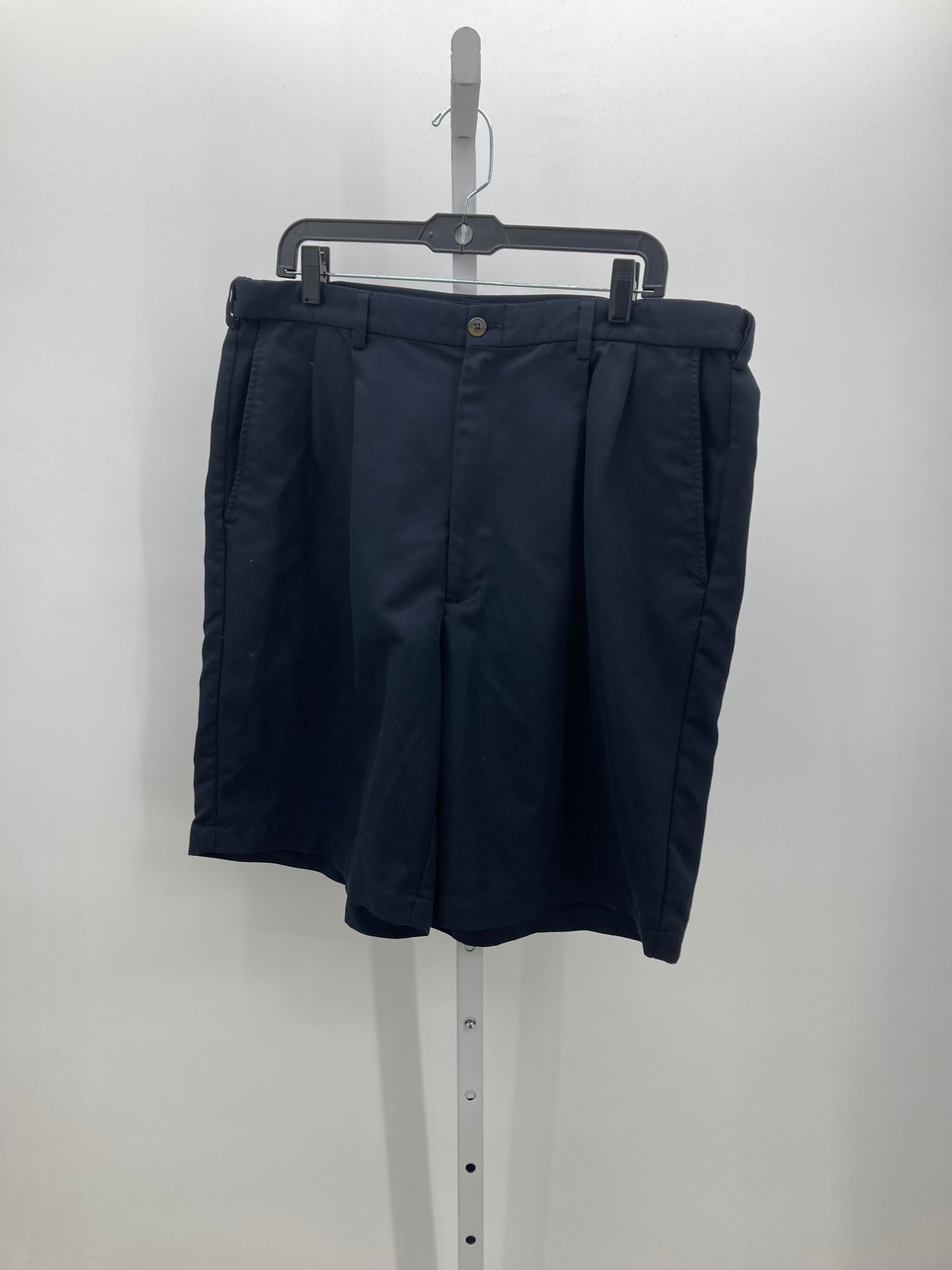 PLEATED FRONT SHORTS.