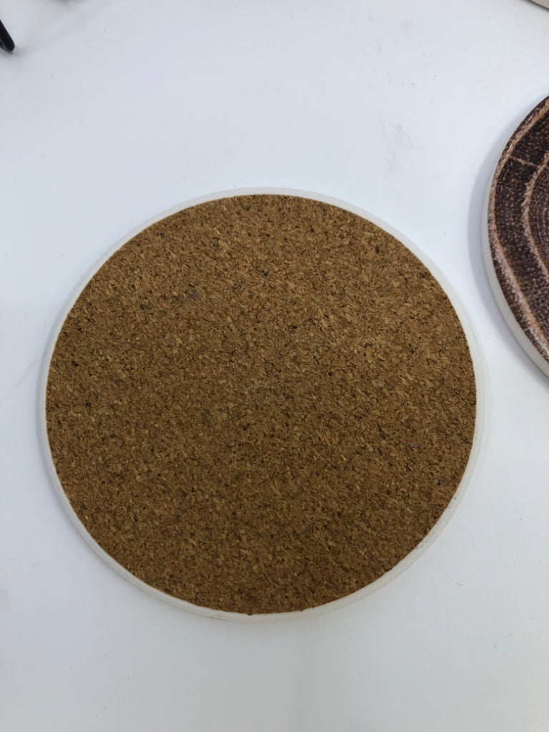 7 PC CERAMIC WOOD SLICE COASTERS W/ HOLDER.