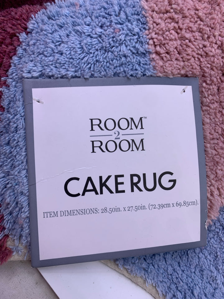 NWT CAKE RUG.